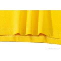 BAPE KIDS Small Net Pocket Ape Man Head Tee Shirt 'YELLOW' -Fusion Wear Shop 1b7aff16