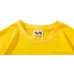 BAPE KIDS Small Net Pocket Ape Man Head Tee Shirt 'YELLOW' -Fusion Wear Shop 84888e9f