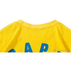 BAPE KIDS Small Net Pocket Ape Man Head Tee Shirt 'YELLOW' -Fusion Wear Shop 8a75b114
